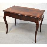 A 19th century rosewood library table, two oak-lined drawers on tapering cabriole supports,