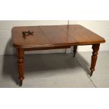 An early Victorian mahogany wind-out dining table, width when extended 146cm.