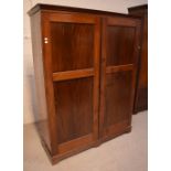 An Edwardian mahogany two-door wardrobe, 170 x 33cm.