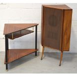 A retro teak-finish angular freestanding speaker on rounded tapering supports,