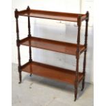 A Victorian mahogany breakfast bar, three shelves on turned supports and castors, height 108 x 89cm.