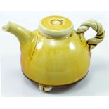 MICHAEL CASSON (1925-2003); a small porcelain teapot covered in honey glaze, impressed MC mark,