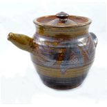 WENFORD BRIDGE POTTERY; a stoneware casserole with spout and side handle, ribbed body,