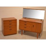 A retro Schreiber mirror-back dressing table, width 99cm and a four-drawer chest of drawers,