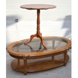 A tilt-top wine table on tripod support, width 59cm and an oval glass top two-tier coffee table,