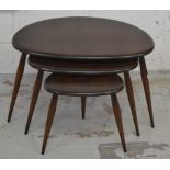 A nest of three Ercol 'Pebble' tables, width of largest 65cm.