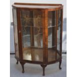 A retro display cabinet raised on cabriole legs, width 87cm.