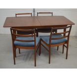 A retro McIntosh & Co Ltd of Kirkcaldy, Scotland teak extending dining table,