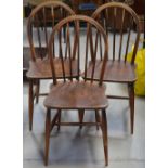 Three Ercol Windsor style dining chairs (3).