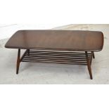 A retro Ercol Windsor elm coffee table, width 105cm.