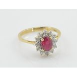 A 9ct yellow gold ruby and diamond ring,