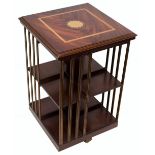 A reproduction mahogany revolving bookcase.