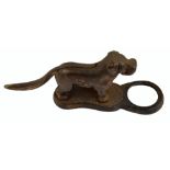 A cast iron dog nutcracker on stand, length 28cm.