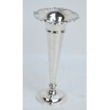 WALKER & HALL; a George V hallmarked silver trumpet vase with shaped rim,