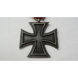 WWII Third Reich group; second class iron cross, paratrooper cloth badge, 1942 rally badge,