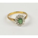 An 18ct yellow gold diamond and oval green tourmaline set ring, size Q, approx 3.9g.