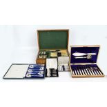 An oak cased canteen of twelve setting cutlery including knife rests and carving set,