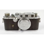 LEICA; a IIIA camera, serial no.193057, 1936, with a Elmar f=5cm 1:3,5 lens, complete with lens cap.
