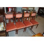 Four Edwardian mahogany dining chairs,