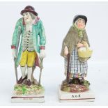 Two similar early 19th century pearlware figures 'Old Age' and 'Age', height 21.75cm and 19.5cm (2).