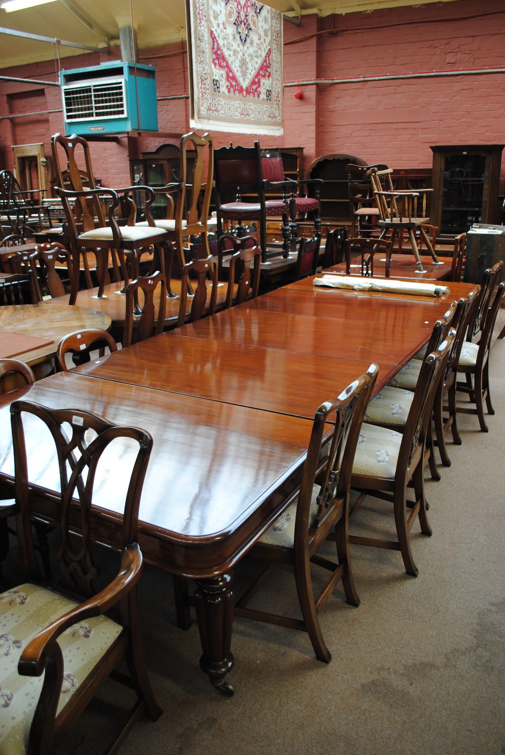 A good early Victorian mahogany extending dining table,