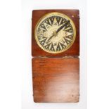 A 19th century mahogany cased compass with paper dial and blued pointers, the case 11.7 x 11.7cm.