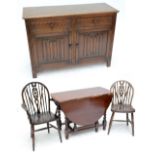 An associated oak mid 20th century dining room suite,