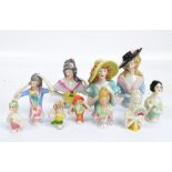 Eleven early and later 20th century half dolls to include a 1930s lady with yellow hat and green