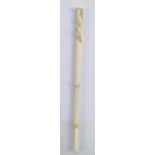A late 19th century carved ivory baton,