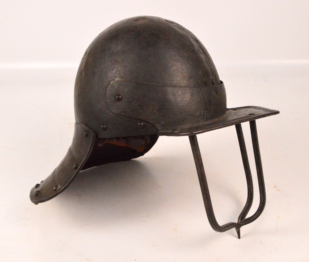 A Victorian reproduction of an English Civil War three bar lobster tailed pot helmet, height 28cm. - Image 2 of 3