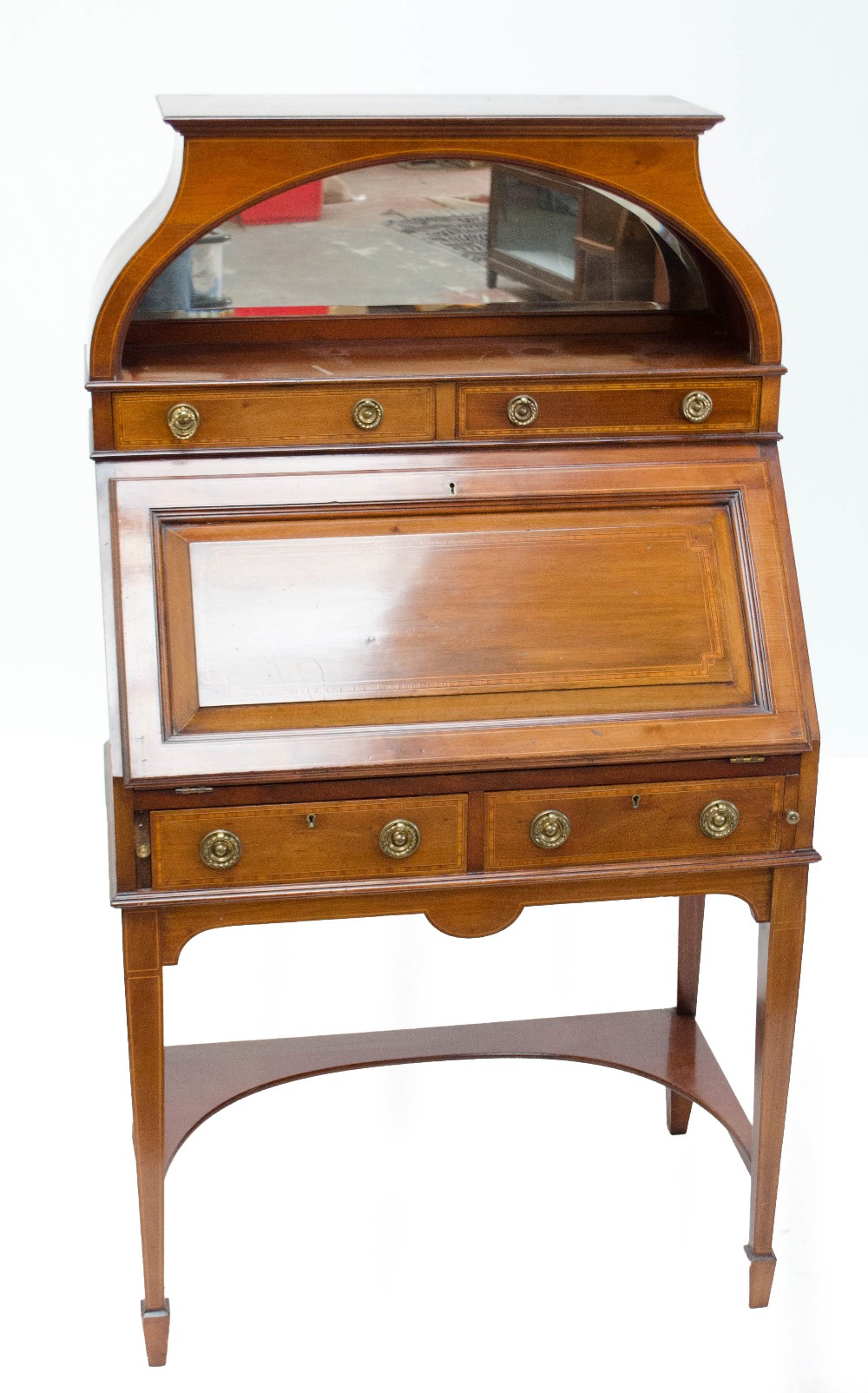 An Edwardian inlaid mahogany bureau with raised mirrored canopy, two drawers, fitted interior,