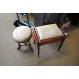 An early 20th century walnut circular adjustable piano stool,