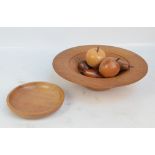 A modern treen set of six fruitwood fruits in a turned ash fruit bowl, diameter 33.