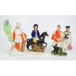 Three large 19th century Staffordshire figures; 'C.S. Parnell', height 35.