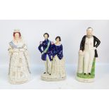 Three large 19th century Staffordshire figures 'Queen of England', height 43cm, 'Moody',