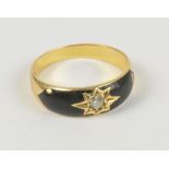 An 18ct yellow gold diamond and black enamel set mourning ring,