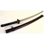 A Japanese katana with shagreen bound grip, iron tsuba, length of blade 66cm,