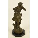 AFTER ERRAND; a spelter figure of a flautist raised on an octagonal plinth, height 32.5cm.