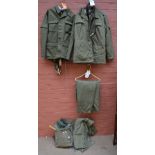 An East German military lightweight jacket with detachable collar and trousers with suspenders,