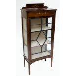 An Edwardian mahogany and inlaid small display cabinet and a 1940s display cabinet (2).