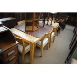 A modern dining table and six elbow chairs (7).