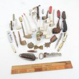 A collection of pipes including a carved wooden example, two transfer printed ceramic examples,