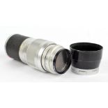 LEITZ WETZLAR; an Elmar 1:4/135, 1892916 lens, in associated case.