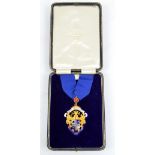 A 9ct yellow gold and enamel 'Past Mayoress' jewel bearing the Bury town crest and motto with red