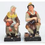 A pair of early 19th century pearlware figures 'Cobbler and his Wife', both bearing K.D.