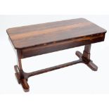 A 19th century rosewood library table with beaded decoration, two short drawers, to tapering legs,
