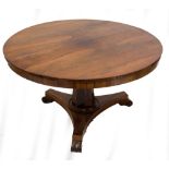 A 19th century rosewood circular breakfast table, with bird cage action tilt-top,