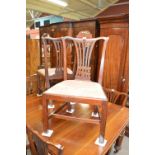 A set of six George III mahogany dining chairs, with pierced splat back,