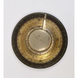 An early 19th century ship's brass and nickel plated weighted circular compass,