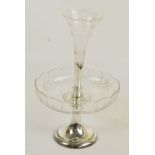 A silver plated and glass epergne centrepiece comprising a plated stand with single cut glass